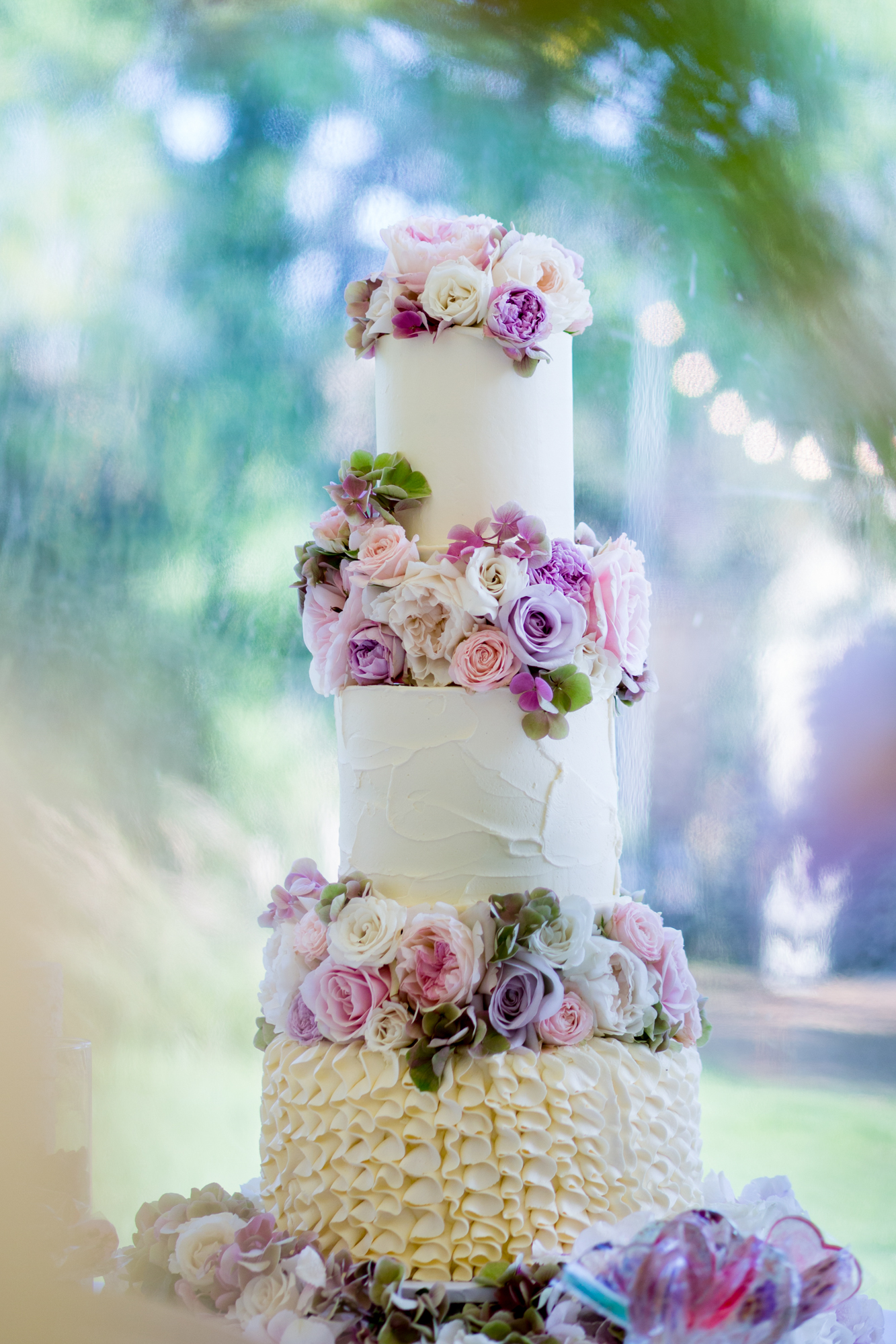 3 tier floral wedding cake by The Vanilla Pod Bakery
